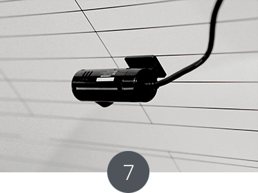 Attach the rear camera on the rear window following the same method as the front camera.
